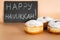 Happy Hanukkah. Traditional Jewish dessert Sufganiyot. Celebrating Judaism holiday. Donuts with jam and sugar powder.