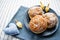 Happy Hanukkah. A traditional treat of doughnuts with David star and dreidel made from cheese and biscuit sticks. Blue fabric