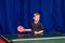Happy happy child plays ping pong