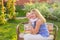 Happy harmonious family outdoors. mother laughing and playing with baby in the summer on the nature