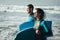 Happy healthy bodyboard surfing couple