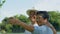 Happy and healthy couples Asian photo and VLOG selfie together for social media in park on leisure. Family and friendship