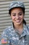 Happy healthy ethnic female army soldier