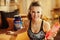 Happy healthy sports woman with shaker with fitness supplements