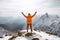 happy hiker celebrating success on the top of a mountain with raised arms, wearing an orange jacket, concept of overcoming a hard