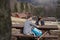 Happy hiker taking a short break in shelter