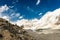 Happy hiker walking in the mountains. Himalayas, Everest Base Camp trek, Nepal