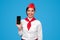 Happy Hispanic stewardess advertising airline app