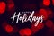 Happy Holidays Calligraphy with Red Duotone Bokeh Lights Background