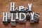 Happy Holidays in metal type