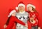 Happy Holidays. small girls love their father. dad embrace daughters. bearded santa man with kids. knitted fashion for