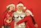 Happy Holidays. small girls love their father. dad embrace daughters. bearded santa man with kids. knitted fashion for