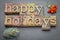 Happy Holidays in wood type