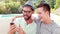 Happy homosexual couple on mobile phone