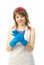 Happy housewife putting on blue rubber gloves