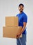 Happy indian delivery man with parcel boxes