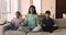 Happy Indian family do meditation at home