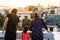 Happy Indian family, parents and daughter, gazing outside from rooftop of their home. A beautiful moment of togetherness and love