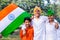 Happy Indian kids holding Indian National flag. Indian Kids celebrating Independence day or Republic day of India