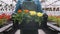 Happy Industrial Greenhouse Worker Carry Boxes Full of Flowers. Smiling and Happy man with flowers he Growing.