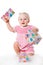 Happy infant girl excited with gifts on white