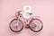 Happy International Womens Day celebrate on eight March. Number eight with pink bicycle on pink background