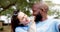 Happy interracial couple, volunteer and selfie for photograph, memory or vlog together in nature. Portrait of man and