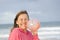 Happy and joyful woman with smiley balloon