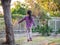 Happy kid, asian baby child girl is walking in the garden