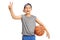 Happy kid with a basketball making a victory sign