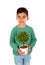 Happy kid with a beautiful plant for his mother