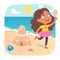 Happy kid eating ice cream on sea beach with funny sand castle, girl holding sorbet