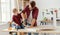 Happy kid helping father in carpentry studio