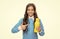 Happy kid point index finger at yellow plastic liquid drinking bottle, beverage product