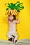Happy kid wants to have banana fruit. Palm tree with growing bananas
