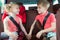 Happy kids, adorable girl with her brother sitting together in m