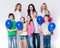 Happy kids and adults standing at white background, copy space