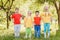 Happy kids in colorful t-shirts outdoors