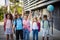 Happy kids. Group of elementary age schoolchildren  outside