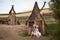 Happy kids having fun hiding in a fantasy wooden playhouse