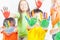 Happy kids with painted hands. International Children\'s Day