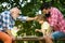 Happy kids time. Happy loving family. Grandfather and grandson playing chess with handsome man. Elderly man practicing