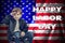Happy Labor day banner, american patriotic background. American Boy salutes with his hand, toned