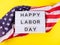 Happy Labor Day greetings on lightbox with american flag