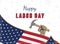 Happy Labor Day holiday banner with a construction tool in hand. Template with United States national flag and original