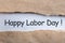 Happy labor Day - message in torn envelope. Labour day celebrated at May 1st. Spring time