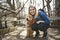 Happy Labradoodle Dog and woman outside at the park