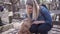 Happy labradoodle dog and woman outside at the park