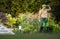 Happy Landscaper in Front of His Garden