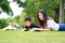 Happy latino family reading book